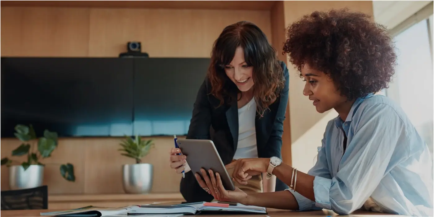 2 ladies working in a modern environment
