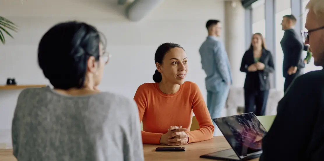 a-diverse-team-of-business-professionals-engaged a-diverse-team-of-business-professionals-engaged