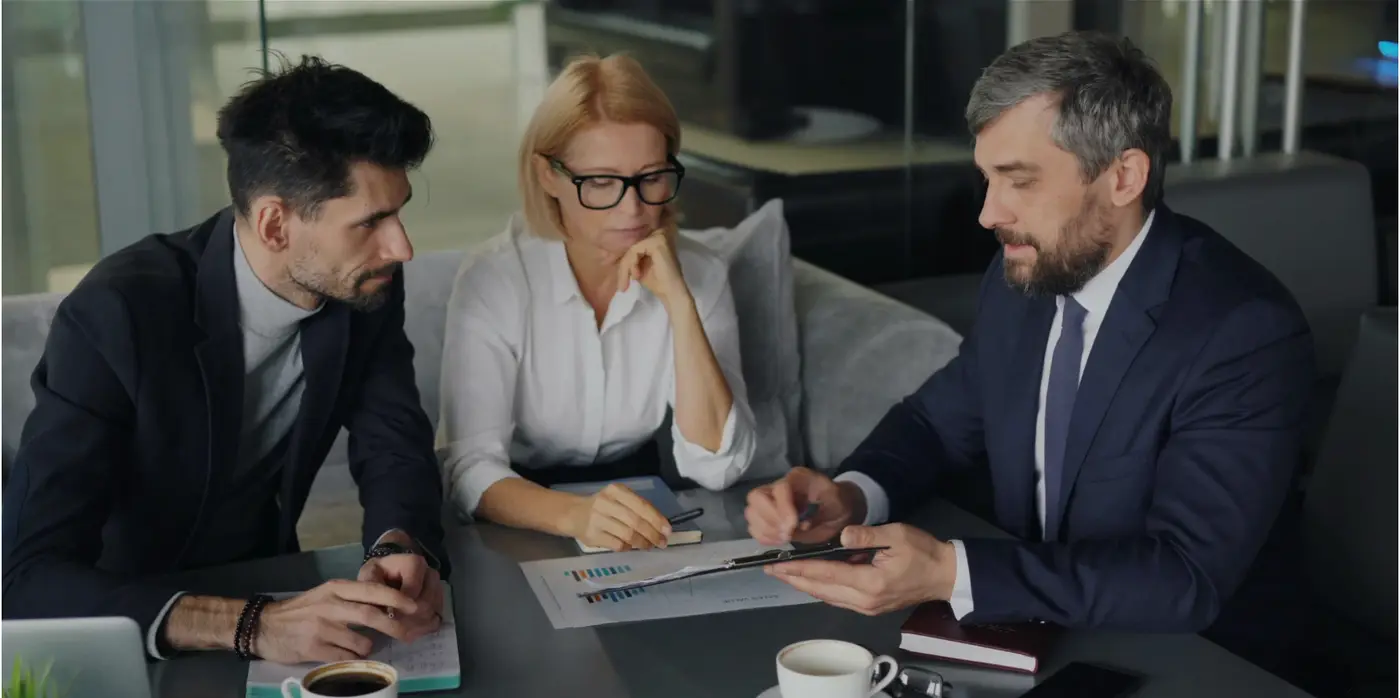 People busy discussing project People busy discussing project